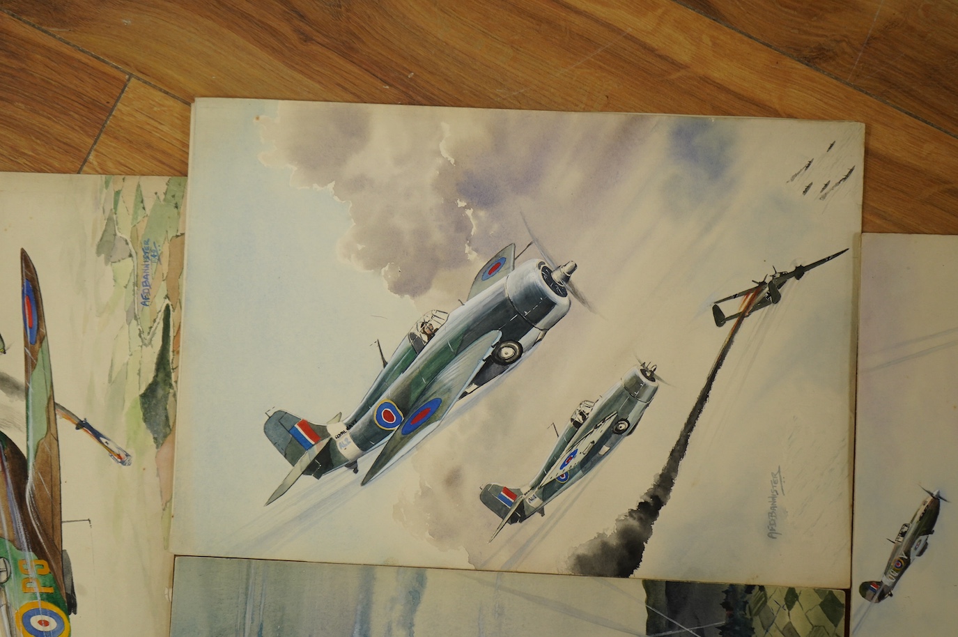 AFD Bannister, set of four original WWII watercolours for post card designs, RAF Aircraft to include ‘Hawker Hurricanes in combat’ and ‘The End of the Raider, Bristol Beaufighter downs a Heinkel III k’, each signed with
